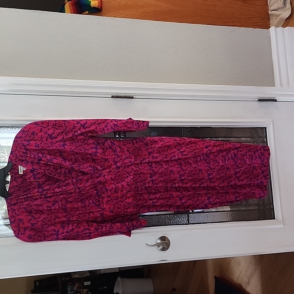 Vintage silk dress with waist smocked in back, combo button and zipper closure.